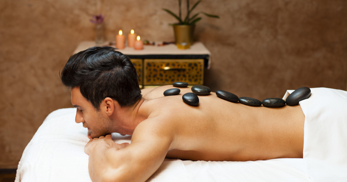 Hot Stone Massage: Benefits and What to Expect - Elements Massage - Bellmore - Merrick