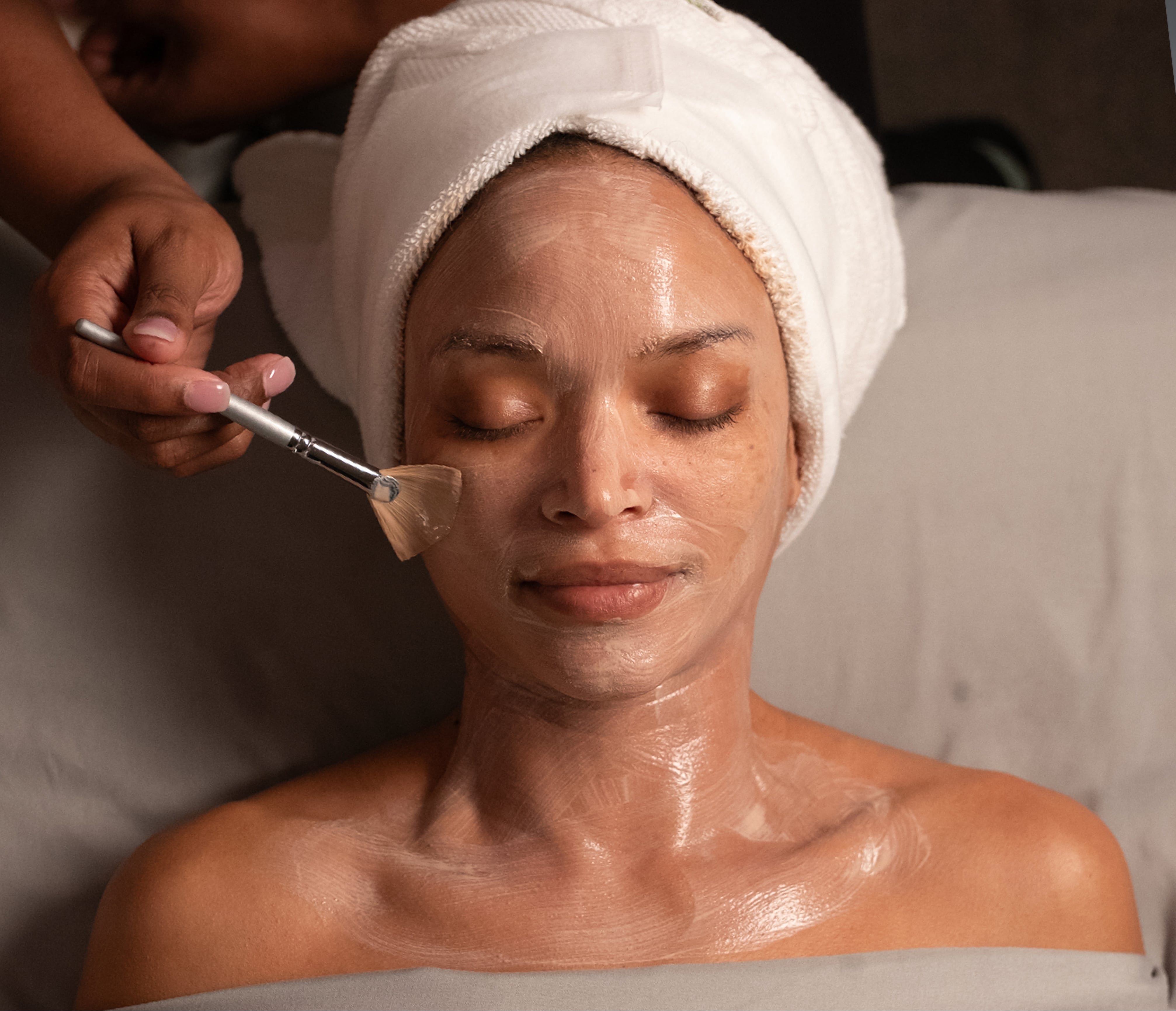 woman receiving facial
